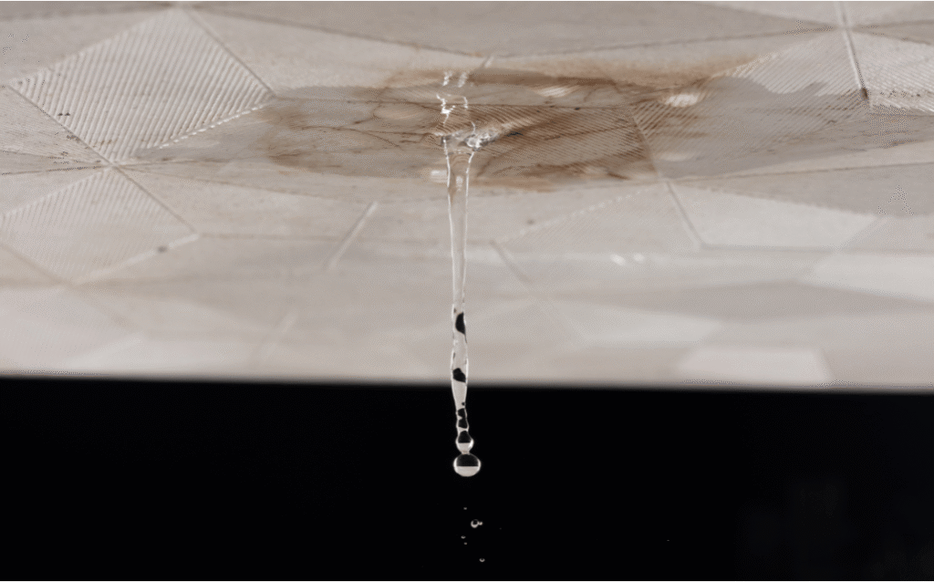 Water stains on a ceiling caused by a hidden plumbing leak